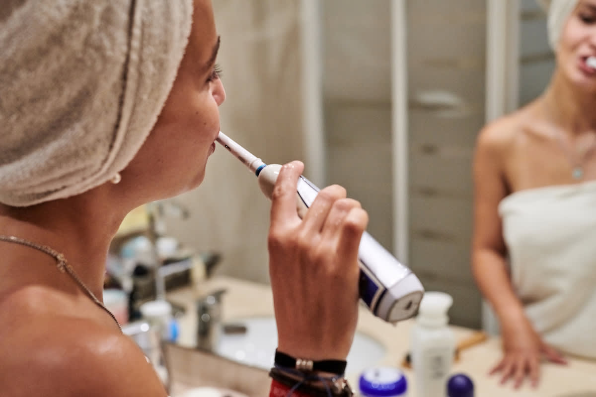 girl brushing teeth